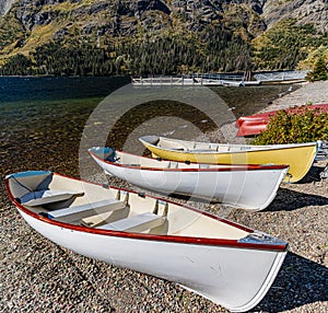 Canoes on The Shore of Two Medicine Lake photo