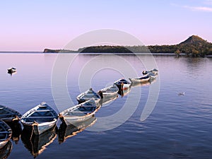 Canoes in sunset