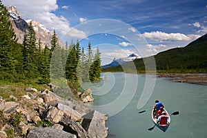 Canoing in Bow river in Banff National Park photo