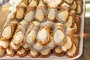 Canolli are typical sicilian sweets filled with ricotta