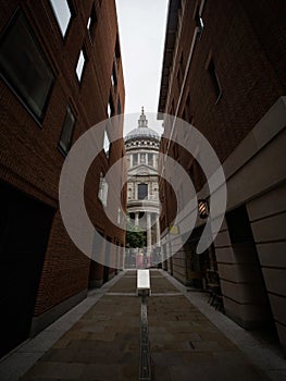 Canon Alley Queens Head passage narrow lane facade architecture of St Pauls Cathedral London England Great Britain UK