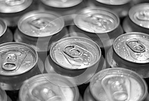 Cans with water drops macro shot