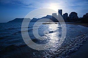 Cantal roig beach in blue sunset at Calpe in Alicante photo