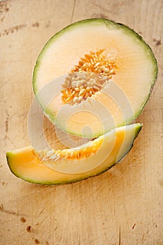 Cantaloupe melon slice and one half