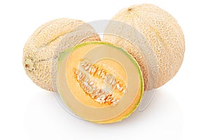 Cantaloupe melons and section on white
