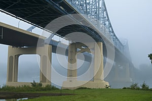 Cantilever Bridge in Fog Over Mississippi River photo