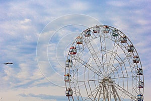 Cantilevered observation wheel in Ceboksary Russia on the blue sky