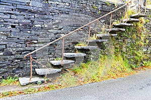 Cantilevered steps, slate in wall photo