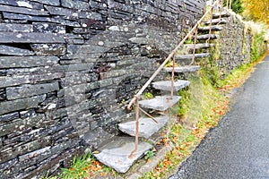 Cantilevered steps, slate in wall photo