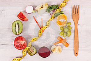 Cantimeter and clock made of fruits and vegetables containing minerals, time to diet and slimming concept