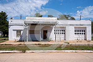 Abandoned gas station, weathered and rusted, along old historic Route 66
