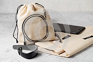 Canvas bag with drawstring, mockup of small eco sack made from natural cotton fabric