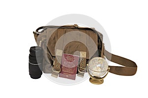 Canvas bag, zoom lens, UK passport and globe