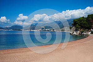 Canvas chairs on the beach. The coastal strip of Montenegro. Sandy beach of Montenegro.