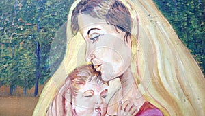 A canvas painting of a mother and son.