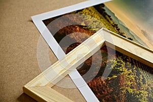 Canvas print and wooden stretcher bar on fiberboard table. Photo printed on canvas