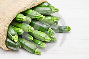 Canvas sack full of zucchini