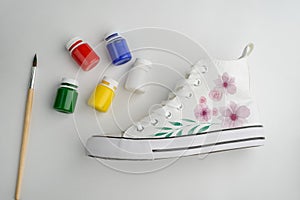 Canvas sneakers with handpainted flowers