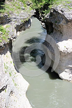 Canyon with a fast mountain river below