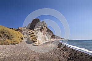 Canyon mountains and sea with black volcanic beach on Vlychada