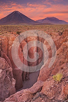Canyon and Volcan Licancabur, Atacama Desert, Chile photo