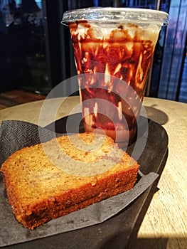 A cap of coffee and cake