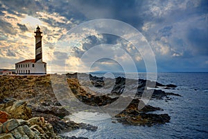 Cap de Favaritx sunset lighthouse cape in Mahon