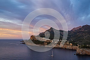 Cap de Sa Creu cape sunset in Majorca photo