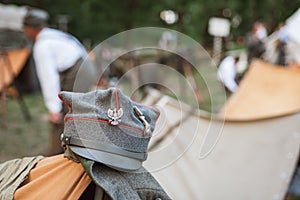 Cap with the emblem of Poland on a tent