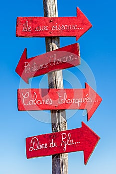 Cap Ferret, Arcachon Bay, France. Decorative signs on the beach