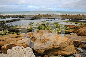 Cap Gris Nez in Cote d`Opale, Pas-de-Calais, France: View from the beach with colorful rocks.