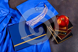 Cap put on the book and certificated in graduate education concept