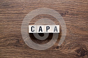 Capa - word concept on building blocks, text photo