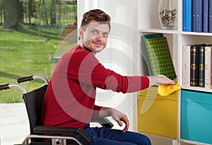 Capable of disabled man wipes the dust