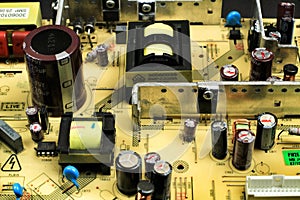 Capacitors and other components in an electronic board