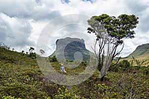 Capao, Brazil - Jan 05, 2024: Hiking trail to Aguas Claras waterfall in Vale do Capao, Palmeiras, Bahia, Brazil