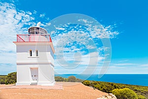 Cape Borda square lighthouse viewed towards the ocean photo