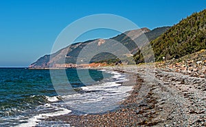 Cape Breton Coastline With Cabot Trail Winding Into The Highlands