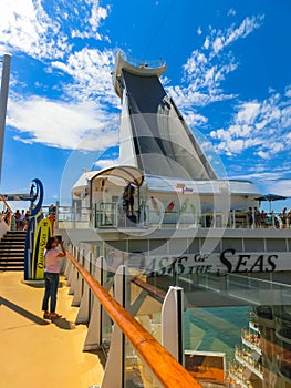 Cape Canaveral, USA - April 29, 2018: The passenger flying at zip line at cruise liner or ship Oasis of the Seas by