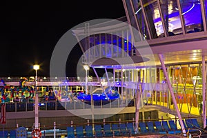 Cape Canaveral, USA - May 02, 2018: Open deck in the night time. Giant cruise ship Oasis of the Seas by Royal Caribbean.