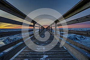 Cape Cod Boardwalk at sunset in winter