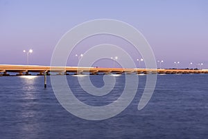 Cape Coral Midpoint Bridge at sunset long exposure.