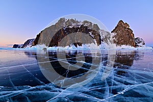 Cape Khoboy with Cracked Blue Ice of Lake Baikal at Twilight