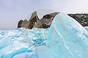 Cape Khoboy rock on Olkhon Island, Lake Baikal, ice hummocks in winter, Russia, Siberia