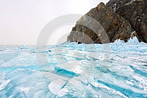 Cape Khoboy rock on Olkhon Island, Lake Baikal, ice hummocks in winter, Russia, Siberia