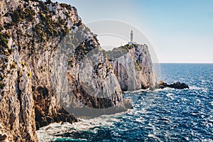 Cape Lefkada or Lefkas lighthouse and cliffs in the southern par photo