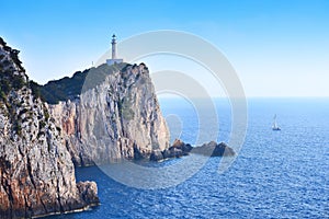 Cape Lefkada Lighthouse with steep cliffs and blue sea