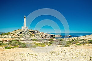 Cape Palos (Cabo de Palos) lighthouse and beach, Spain photo
