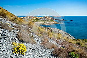 Cape Palos (Cabo de Palos) lighthouse and beach, Spain photo