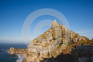 Cape Point view of rockface with lighthouse